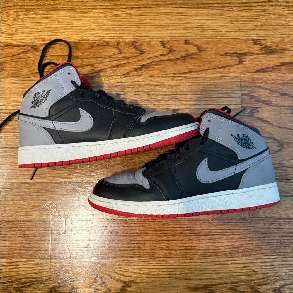 Nike Black and Gray Kids Sneakers with Red Accents